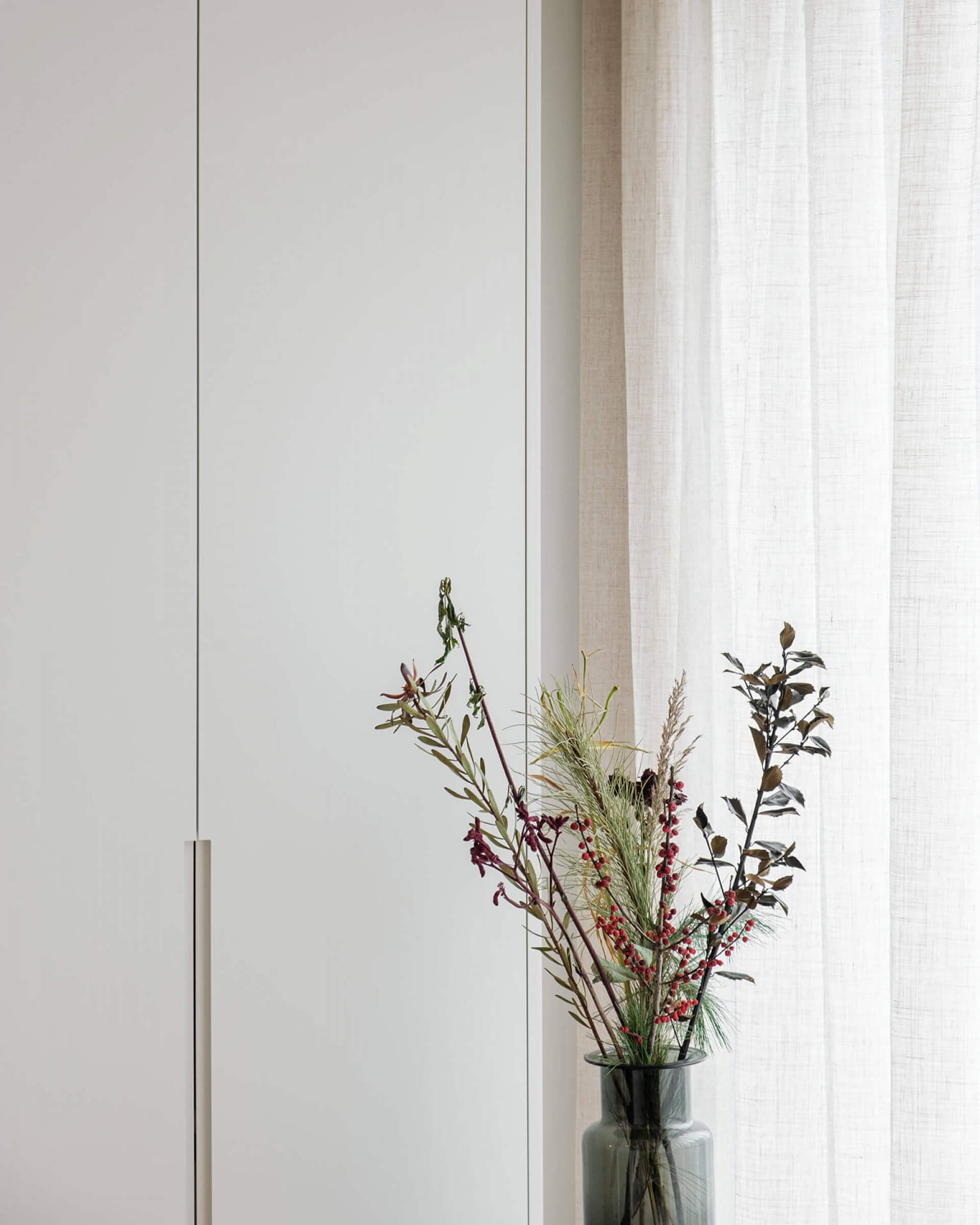  Long milled handles on a custom-made china cabinet