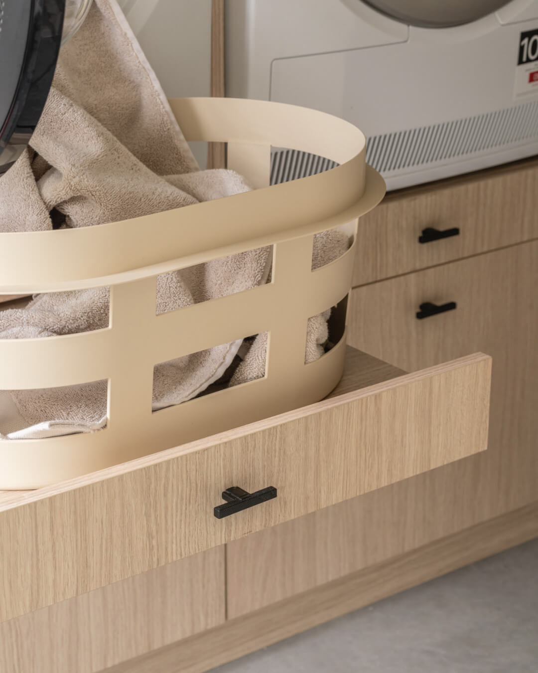 Pull-Out Shelf of the Laundry Cabinet