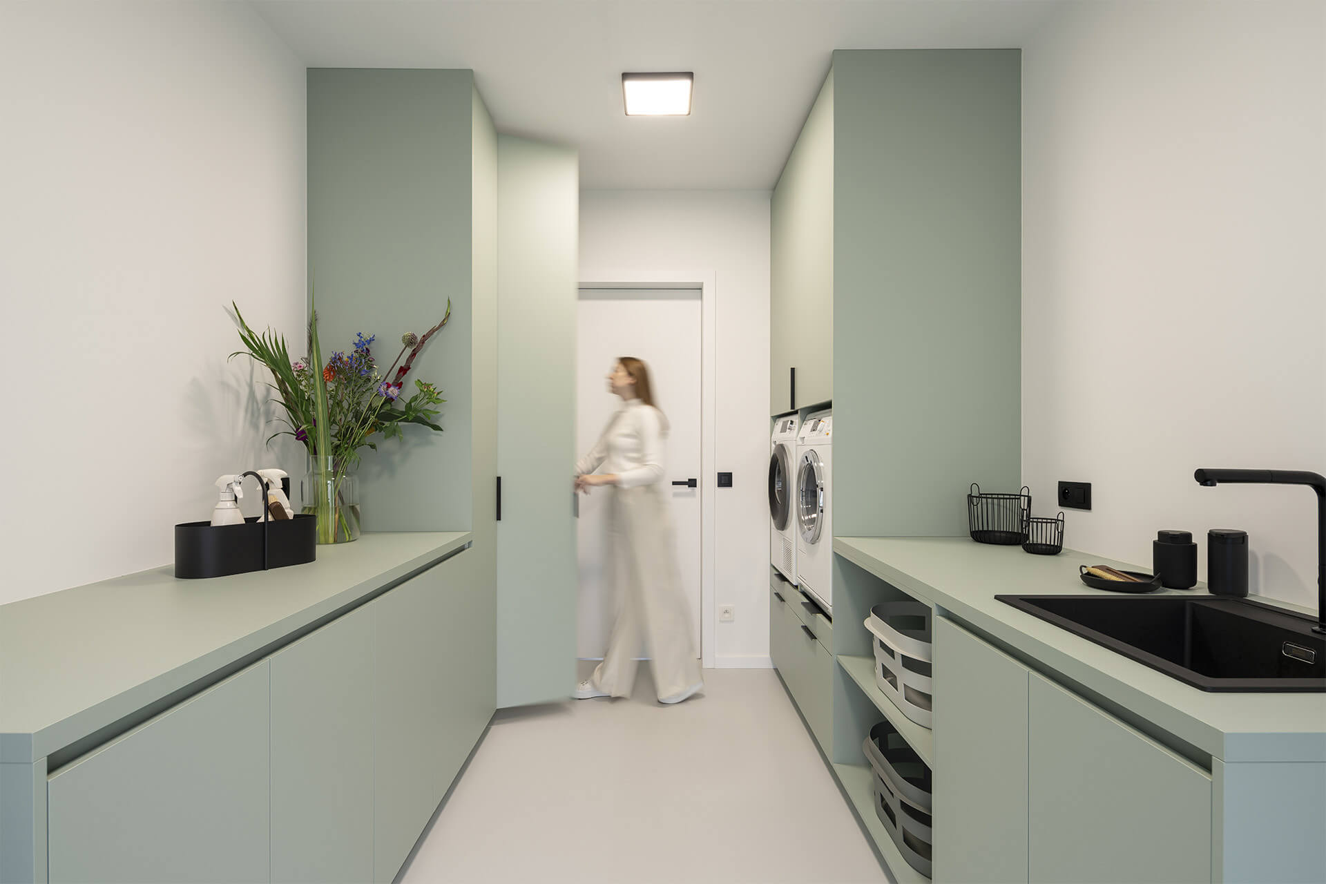 Fitting out a bespoke laundry room with built-in cupboards