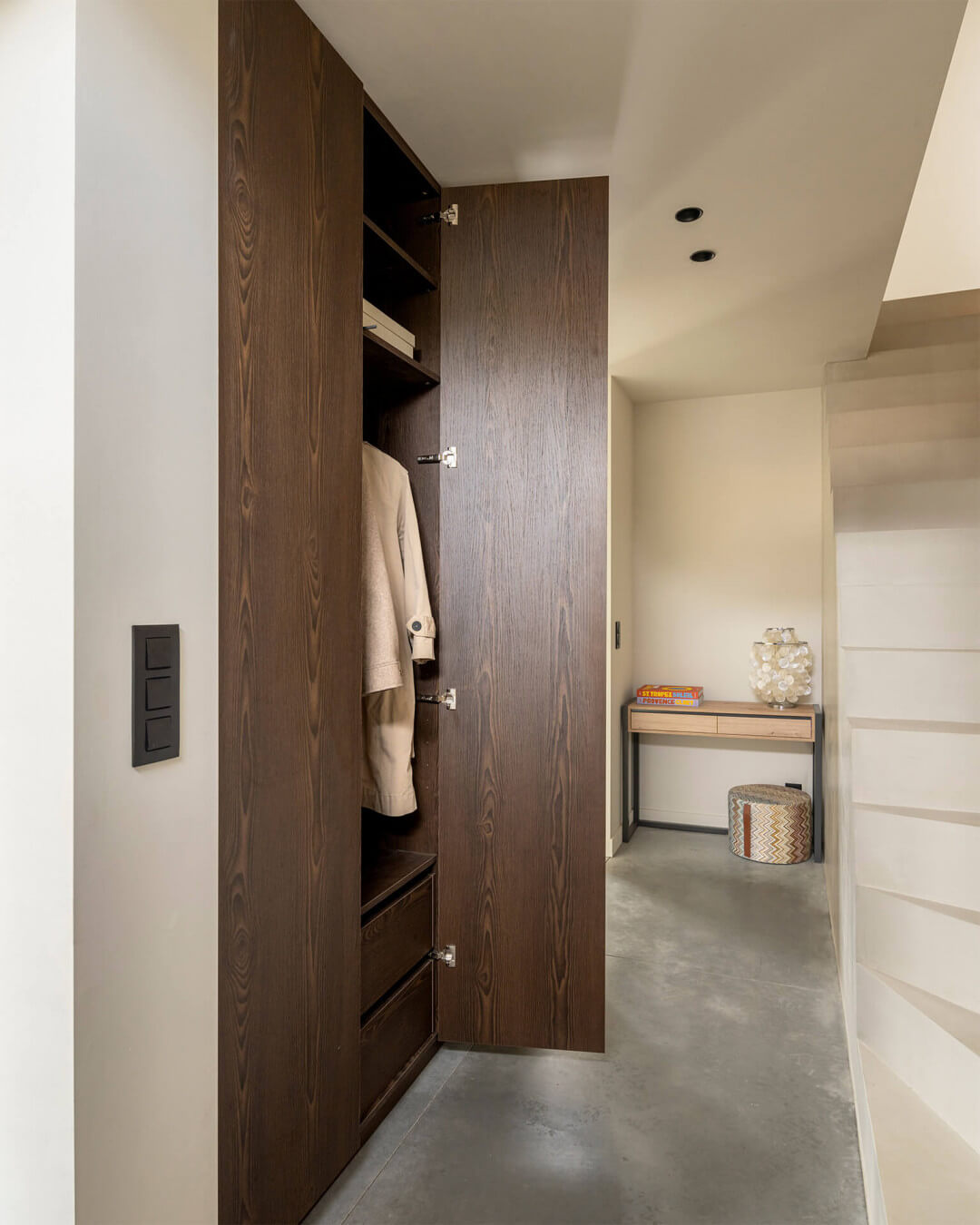 Custom hall closet in dark wood